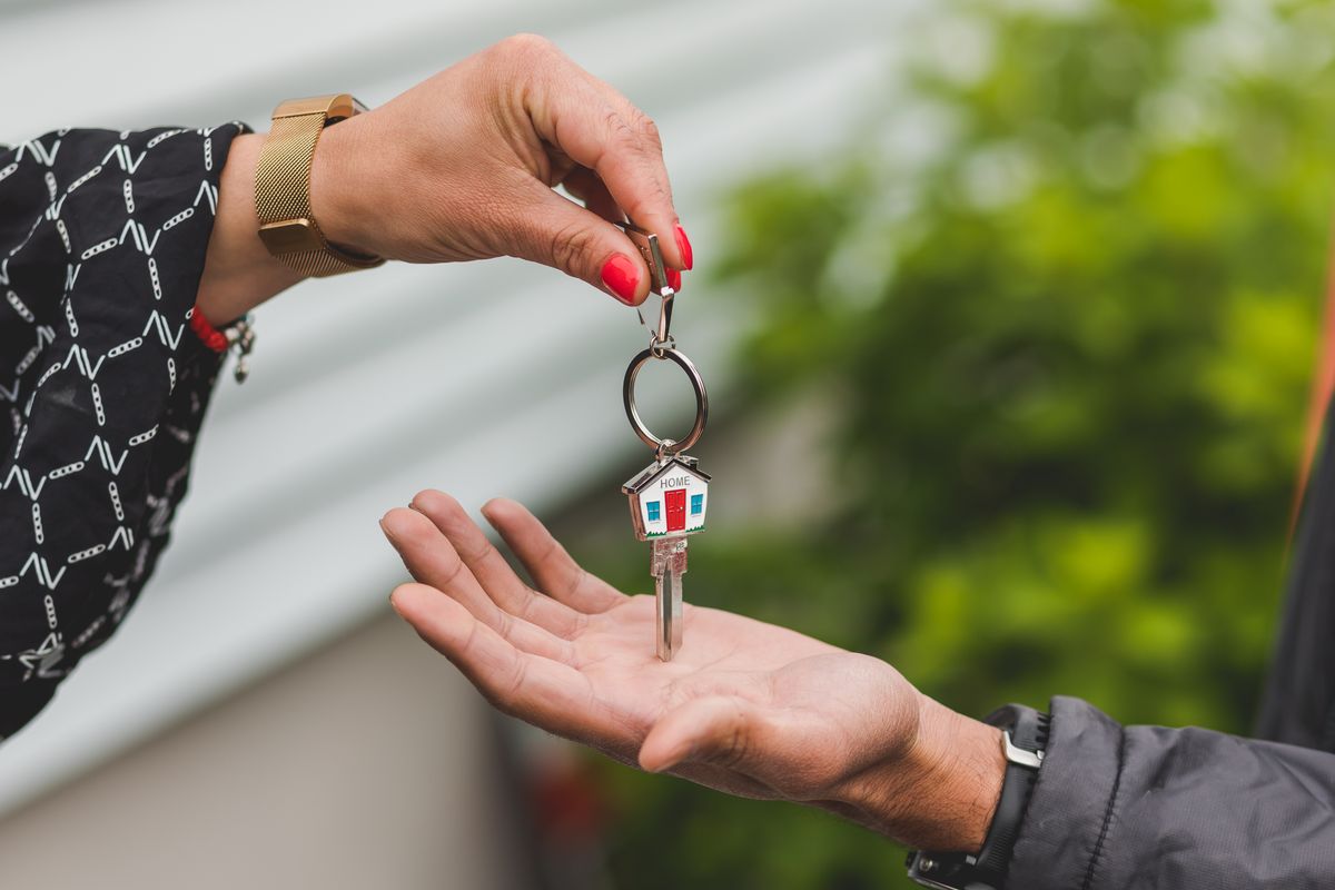House keys changing hands at closing